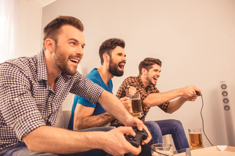 gaming friends having fun in a game room