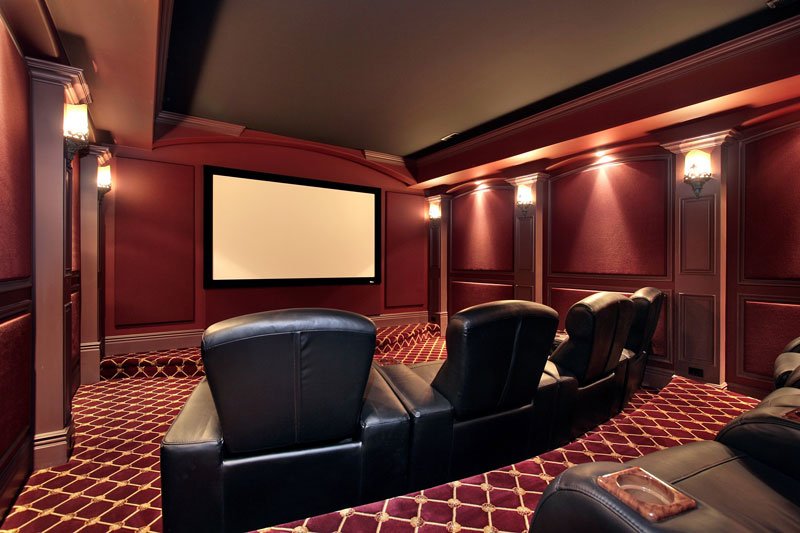 curved seats around projector screen