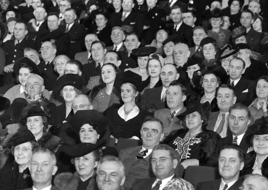 very old photo of audience at a theater