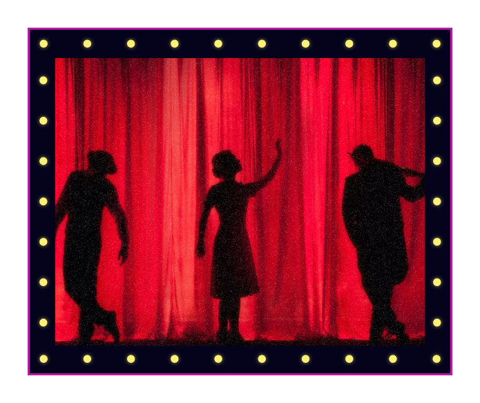 performers behind a red curtain