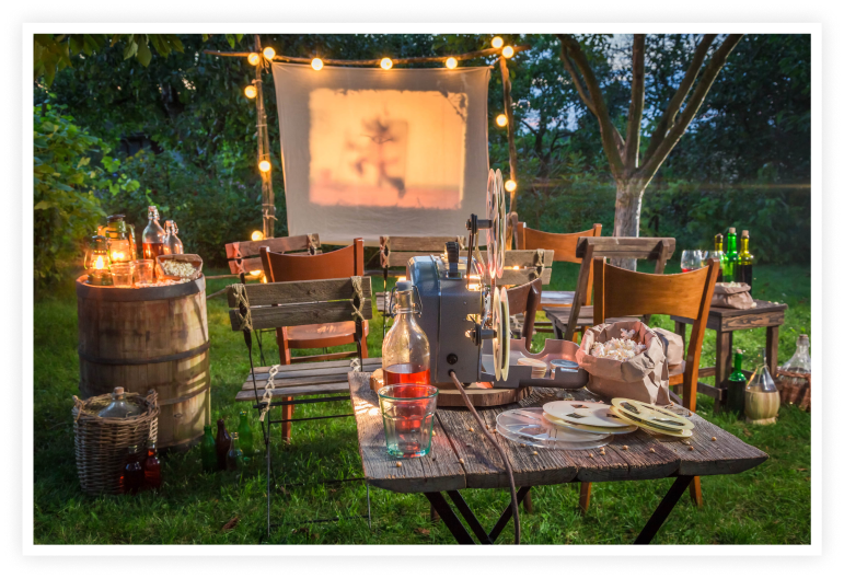 outdoor set up with projector sheet and lights