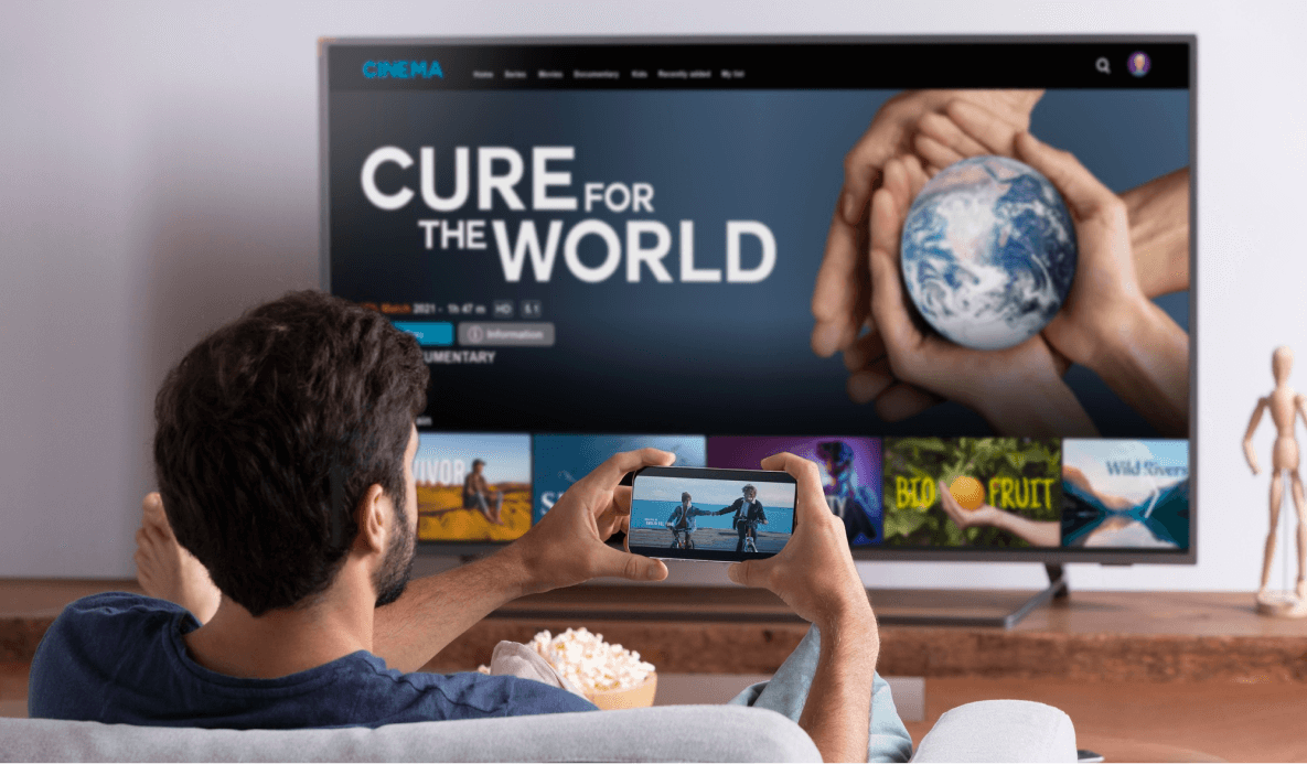 man-watching-tv-and-mobile