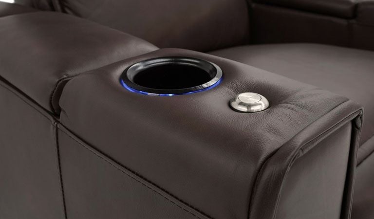 brown leather chair with cup holder and tablet holder