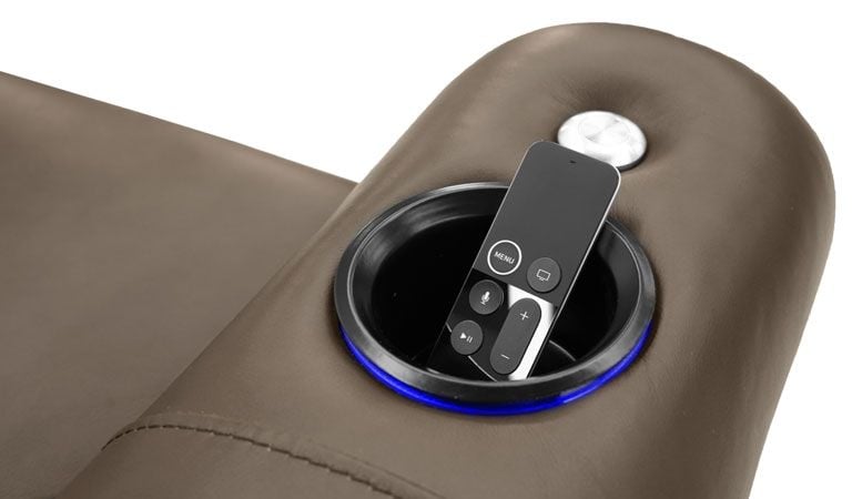 brown theater seating with cup holder
