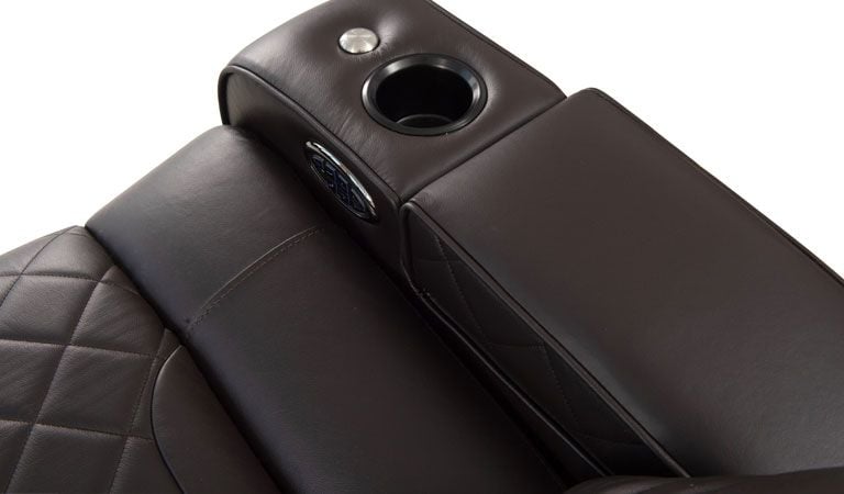 brown leather chair with cup holder and tablet holder