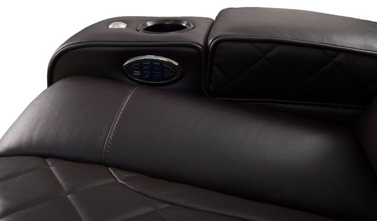 brown leather chair with cup holder and tablet holder