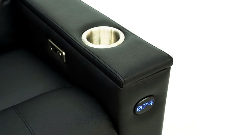 black recliner with two cup holders